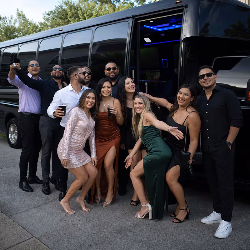 Party bus interior with wraparound leather seating and LED lighting in New Orleans