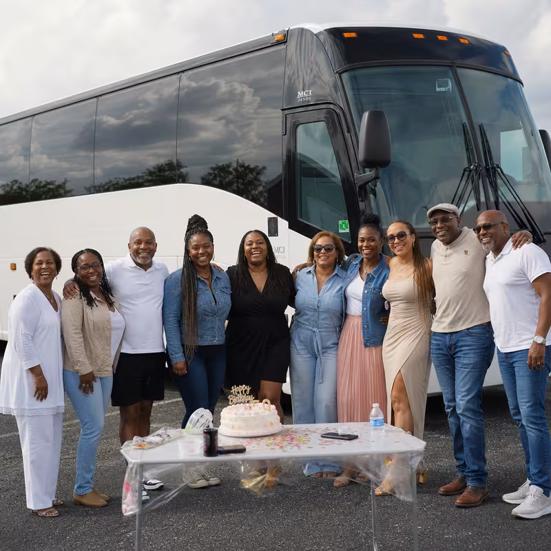 Passengers loading luggage while boarding an New Orleans group shuttle