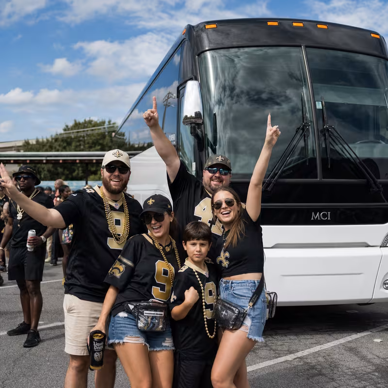 Passengers loading luggage while boarding an New Orleans group shuttle