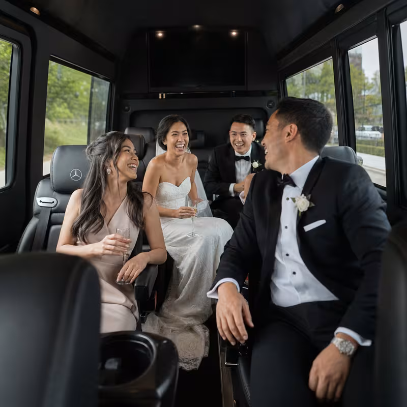 Black Mercedes Sprinter van staged for an New Orleans Wedding Transportation group