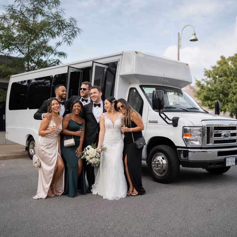 Passengers loading luggage while boarding an New Orleans group shuttle