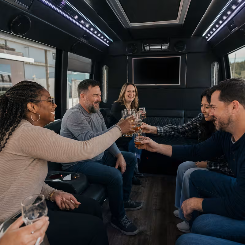 Group boarding a white charter bus for Winery & Brewery Tour Transportation transportation in New Orleans